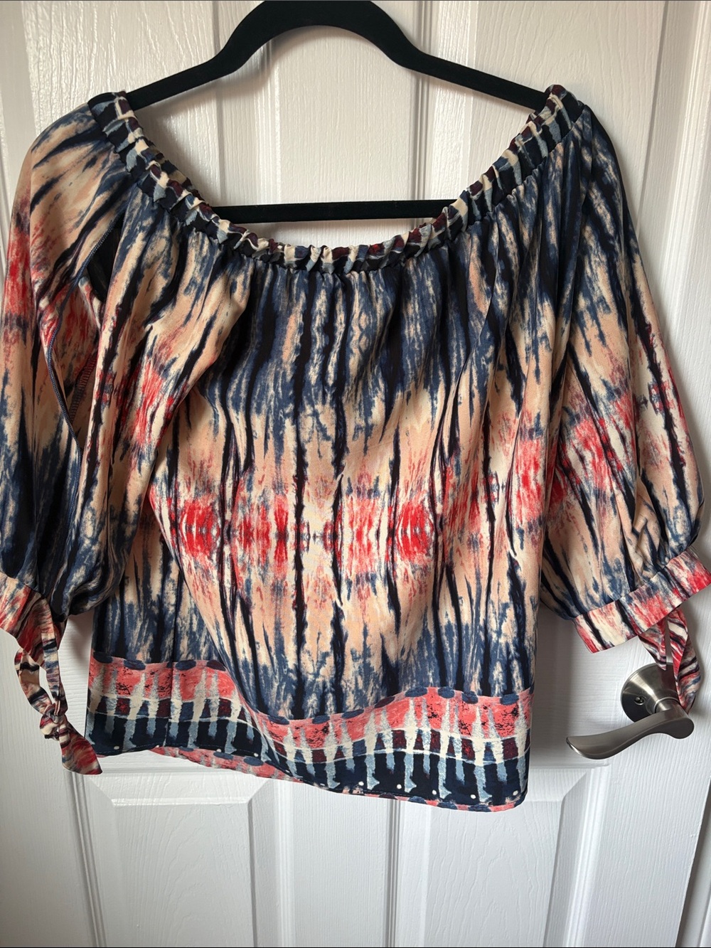 Tyche Off-Shoulder Tie-Detailed Blouse in Navy, Red, and Cream